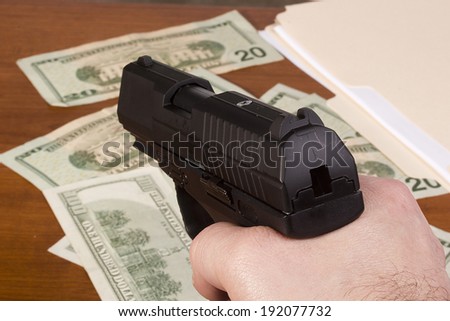 Robbery with the use of a gun.