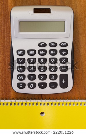 Calculator for simple calculations and notebook to take notes.