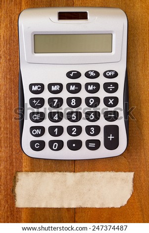 Electronic calculator for financial calculations and a note to fix them.