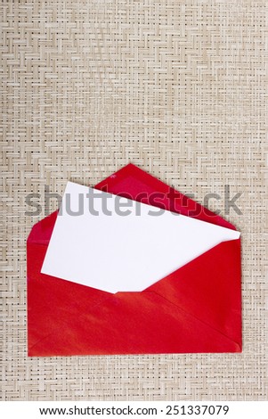 Letter in a red envelope for invitations to visit.