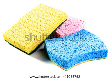 Set scourers for ware washing pink, blue and yellow on a white background.