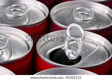 Aluminium containers for soda water, beer or the juice, one bank it is opened.