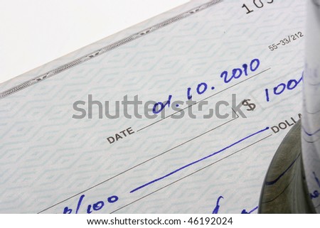The check for payment with a shooting foreshortening for the sum and date.