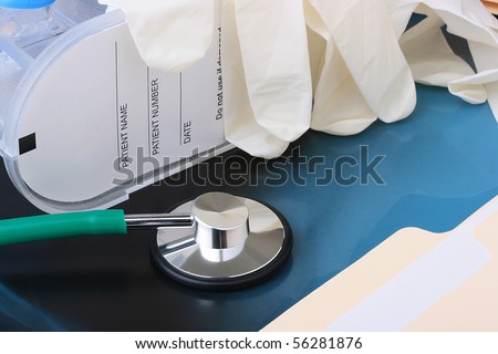 Medical subjects used at hospitalisation: a stethoscope, gloves, a X-ray and others.