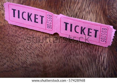 Tickets for a pink cardboard for visiting of show, concerts etc.