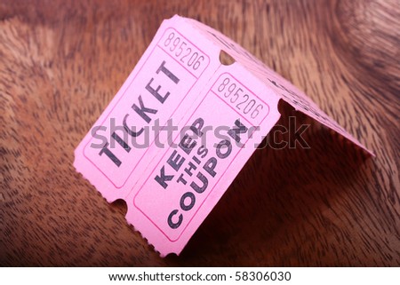 Tickets and coupon for a pink cardboard for visiting of show, concerts etc.