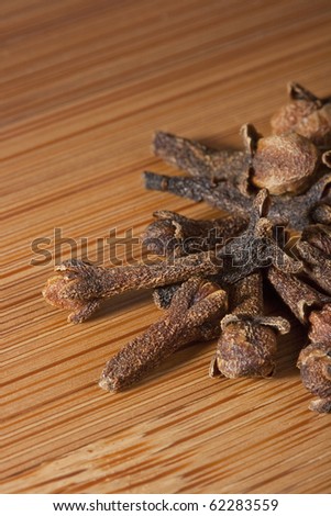 Kitchen board with spices for food seasoning.