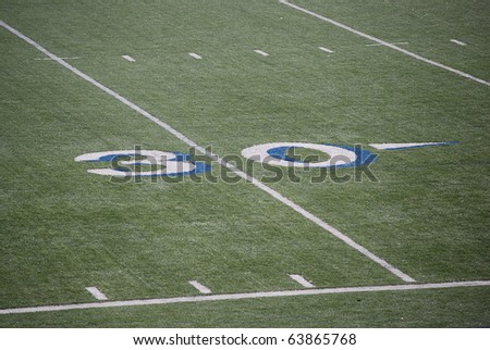 Thirty yards of the mark on the field for the game of American football.