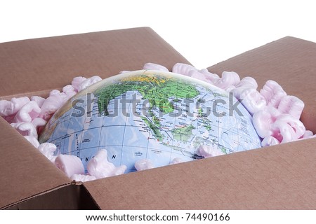 Close-up of a globe in a delivery box.