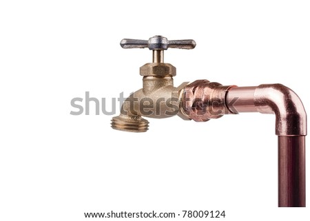 Bronze faucet attached to the water system of copper pipes.