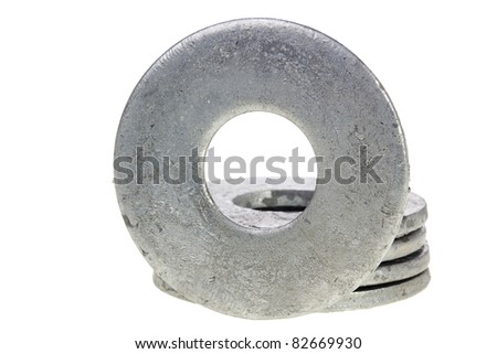 Flat metal washers isolated on a white background.
