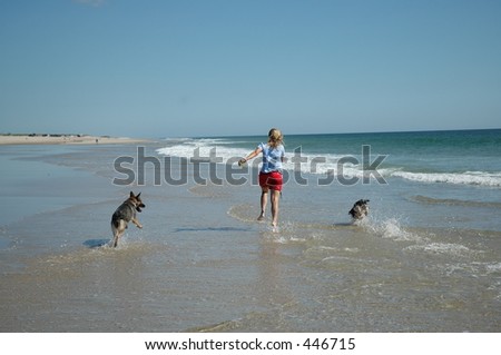 woman running with dogs