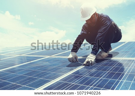 engineer team working on replacement solar panel in solar power plant;engineer and electrician team swapping and install solar panel after solar panel voltage drop
