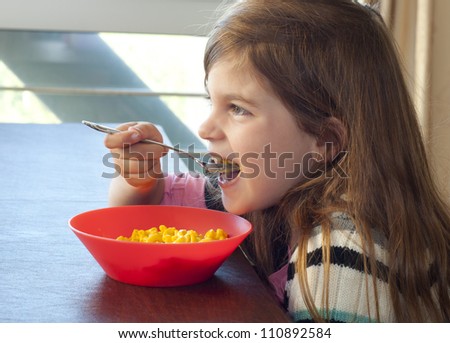 eating macaroni