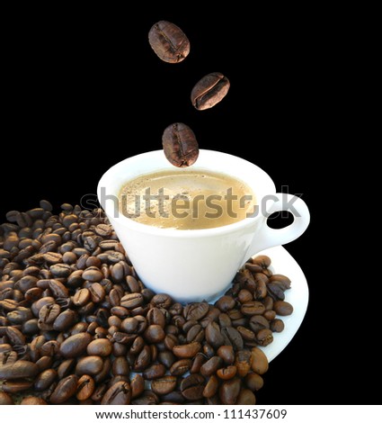 Coffee freshly in white cup and falling coffee beans on black