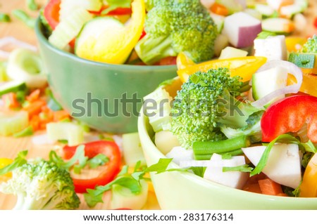 Cut vegetables in bowls