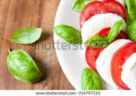 Italian Caprese Salad with Mozzarella Cheese, Tomatoes and Basil