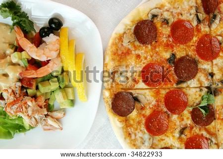 Pizza and seafood salad.