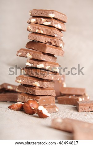 Sweet chocolate stack on canvas (close up)