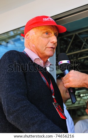 MONZA - SEPTEMBER 11: Formula 1 Driver, Nikki Lauda is talking to the press during the formula one on September 11, 2010 in Monza, Italy
