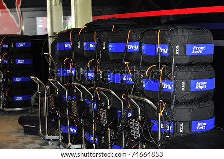 MONZA - SEPTEMBER 11: Racing car tires with blue heat covers in the paddock on september 11, 2010 in monza, italy, formula 1