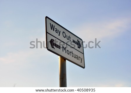Sign giving a choice, live or death, taken from angle. Actual sign has not been altered.