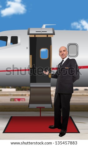 Pilot standing at the door of a private jet
