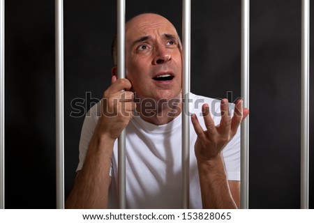 Man asking for mercy in prison