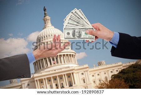 Giving a bribe, hands of businessmen or politicians