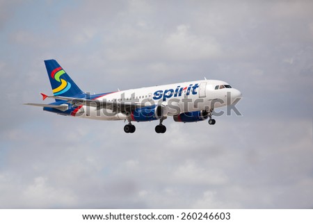 FORT LAUDERDALE, USA - MAR 13, 2015: A Spirit Airlines Airbus A320 on approach in Ft. Lauderdale, FL. Spirit Airlines has its operating base in Fort Lauderdale.