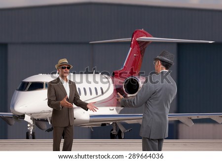 Two business men meeting at the executive airport