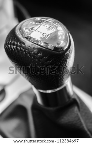 close-up of a manual car gear shift. 5 speed manual.