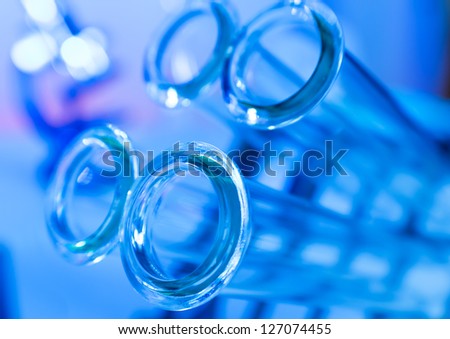 Test tubes on blue background in the lab