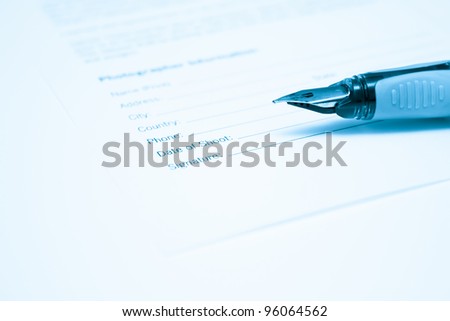 Pen and legal document for signature