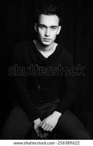 Handsome young man in casual clothes, black and white picture