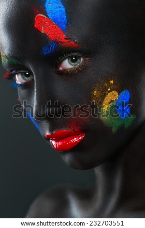 Creative makeup - Portrait of a beautiful woman with black face