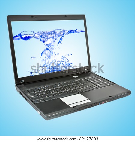 Laptop computer with water on screen.
