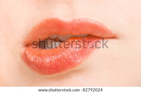 Close-up bite your lip red
