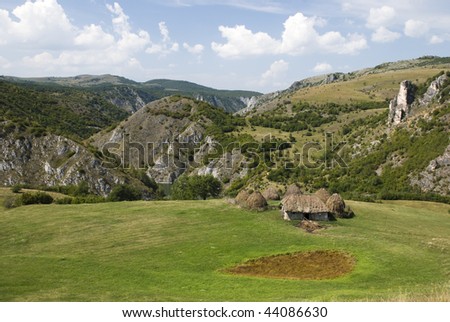 mountain landscape with mountain cottage
