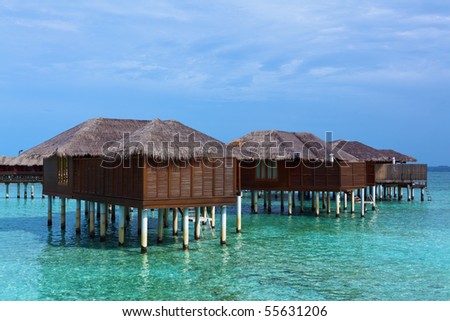 Luxury Water Villas in the Ocean. Welcome to the Paradise! Maldives. High Contrast.