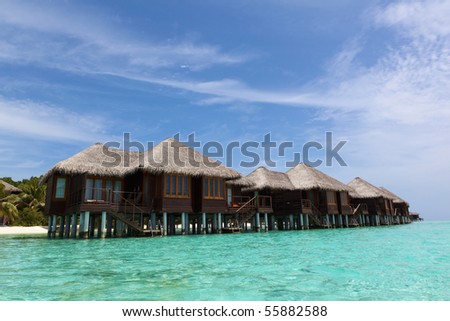 Water Villas in the Ocean. Welcome to the Paradise! Maldives. High Contrast.