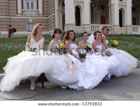 ODESSA, UKRAINE - MAY 23 : group of happy excited brides at Parade of Brides.The annual event takes place in many Ukrainian cities. May 23, 2010 Odessa,Ukraine.