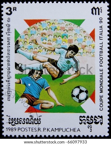 KAMPUCHEA - CIRCA 1989: A post stamp printed in Kampuchea shows image of football players, devoted The 1990 FIFA World Cup,series,circa 1989