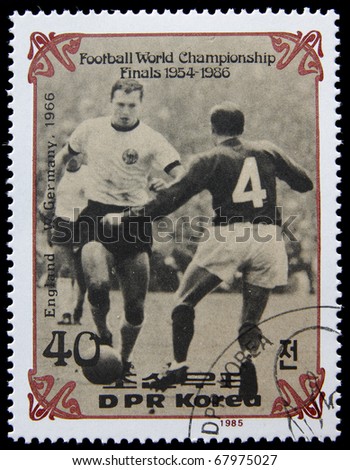 NORTH KOREA - CIRCA 1985:A post stamp printed in North Korea shows football players, devoted football world championship, series, circa 1985.