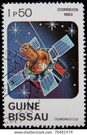 GUINEA BISSAU - CIRCA 1983: A post stamp printed in Guinea Bissau shows satellite ,devoted space communication, circa 1983
