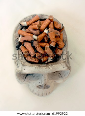 ashtray full of cigarette - bad for health