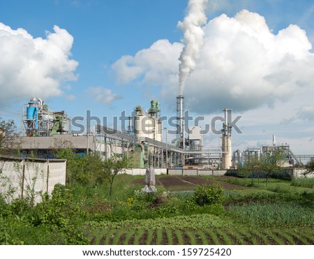 factory smoke, contaminating air with overcast sky