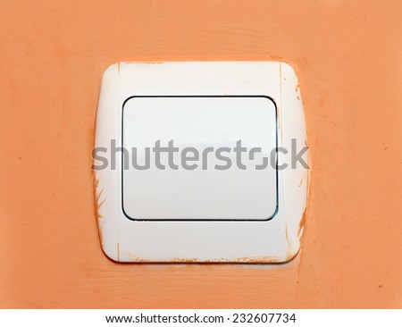 Light switch on a wall