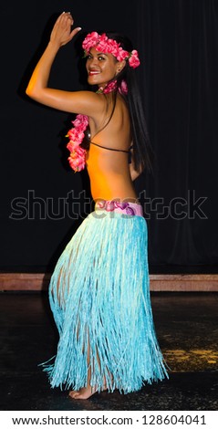 LANZAROTE, CANARY ISLANDS - MARCH 23: Cultural performance of Hawaiian traditional dressed dancer on Barcelo hotel stage on March 23, 2012 on Lanzarote - Canary Islands.