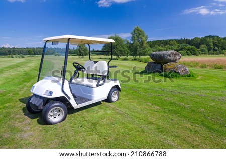 White golf car on Swedish golf course